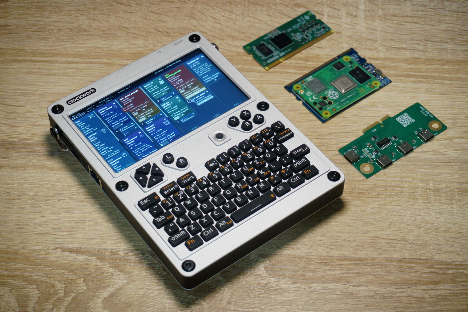 Clockwork Pi uConsole with expansion boards and compute modules
